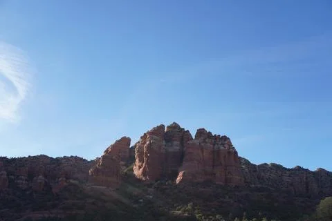 Jagged red rock formations under a clear blue sky Stock-Fotos