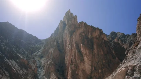 Jagged Rock Summit in Clear Sky Stock Footage 308990959
