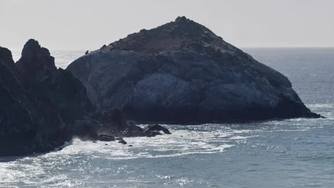 Jagged Sea Stack Rises From Pacific Off Big Sur Stock Footage 310349012