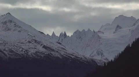 Jagged Snowy Peaks with Grey Clouds 스톡 동영상 48513664