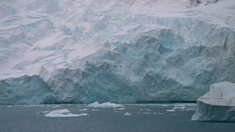 Jagged Surfaces Of Massive Glaciers At Paradise Harbour In Antarctica. Tracking Vídeo Stock 334081929