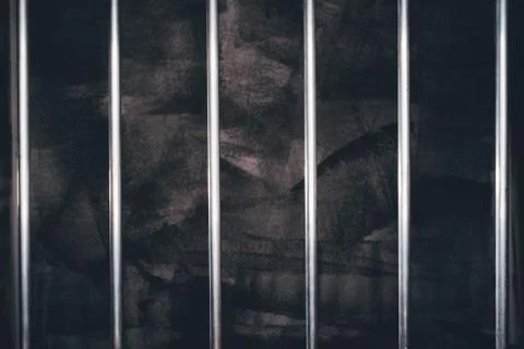 Jail bars, empty dark prison cell Stock Photos