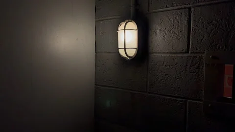 Jail cell bed cage light night cinematic  Stock Footage 225236540