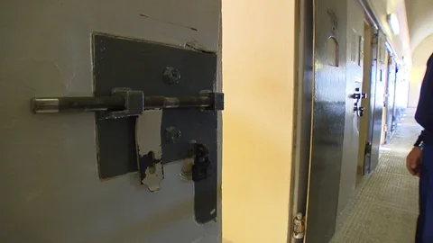 JAIL CELL BEING SHUT Stock Footage 129206483