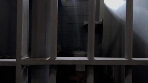 Jail cell door closing dark moody cinematic  Stock Footage 225228151
