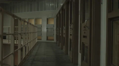 Jail cell doors opening and shower lights coming on Stock Footage 44886978