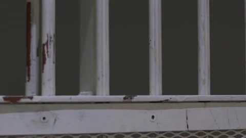 Jail Cell Sliding Closed Bars against Bars 4K Stock Footage 145956714