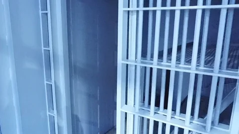 Jail Door Closing Stockbeeldmateriaal 106894588