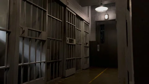 Jail hall prison dolly push moody cinamatic Stock Footage 229516894