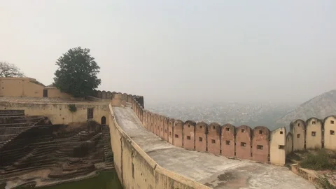 Jaipur, India - defensive structures on a high mountain Stock Footage 123848387