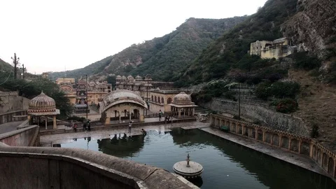 Jaipur, India, November 04, 2019 Galta Ji, an abandoned city among the mountains Stock Footage 123799332