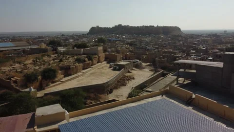 Jaisalmer forward over rooftops day, 4K Drone Shot Stock Footage 200374344