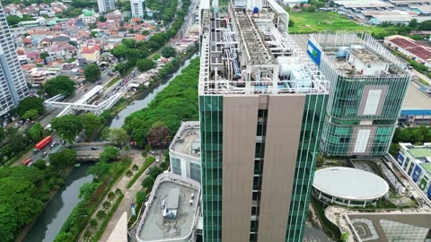 Jakarta City Skyline Featuring MRT Rail and Road Traffic Captured from a Dron Stock Footage 289974751