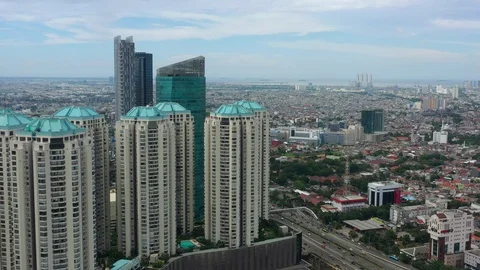 Jakarta cityscape central apartment complex aerial panorama 4k indonesia Stock Footage 129577906