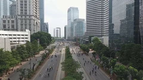 Jakarta Fly Low Between Buildings Stock Footage 82298498