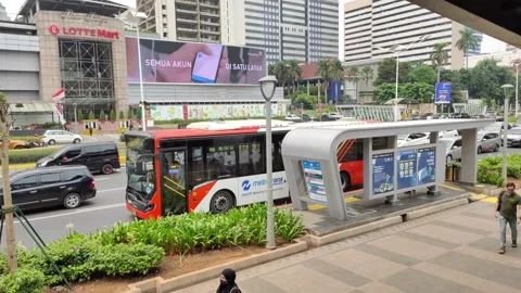 Jakarta, Indonesia - Dec 21, 2019 Transjakarta Bus Stop, Gelora Bung Karno, Stock Footage