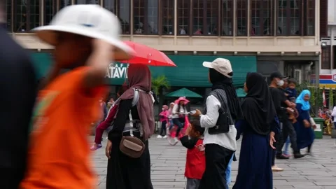 Jakarta, Indonesia - July 2, 2023: tourist walking at Fatahillah park, Jakart Stock Footage 246902053