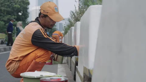 Jakarta Infrastructure Worker Stockbeeldmateriaal 343099142