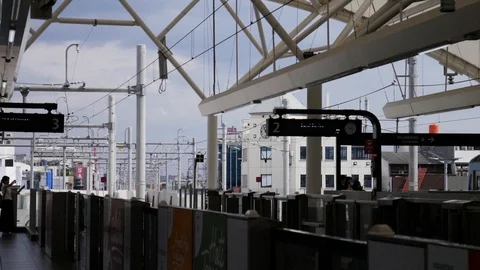 Jakarta MRT - Commuter Leaving Station - Foreground Fence Stock Footage 106969112