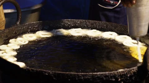 Jalebis being fried Stock Footage 326324280