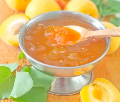Jam and apricots Stock Photos