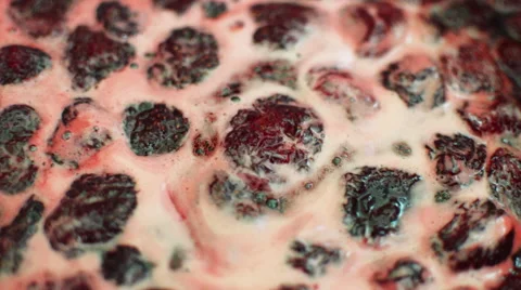 Jam From Berries to Stew in the Pelvis. Bubbles Float up Stock Footage 64331050