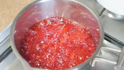 Jam boiling slow motion closeup Video stock 97334380