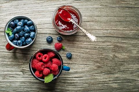 Jam jar with fresh berries Stock Photos