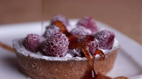 Jam pours for dessert Stock Footage 168341961