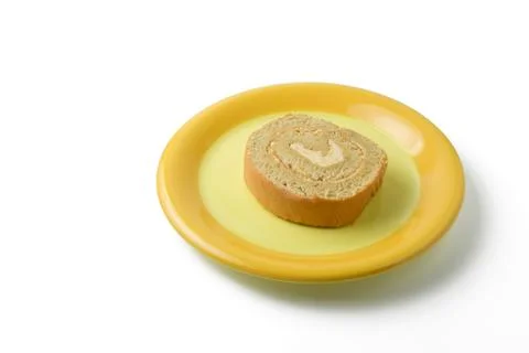 Jam roll on plate Stock Photos