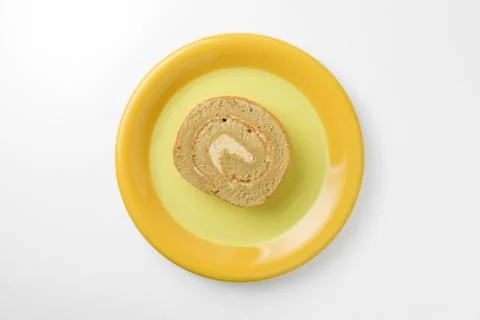 Jam roll on plate Stock Photos