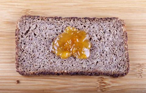 Jam on rye bread Stock Photos