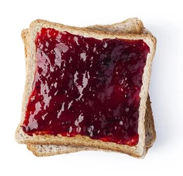 Jam on a slice of Toast. Isolated on a white background Stock Photos