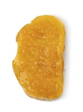 Jam on a slice of Toast. Isolated on a white background Stock Photos