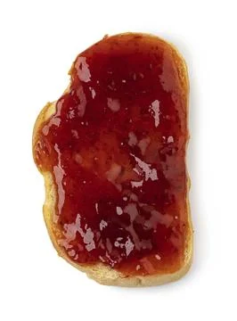 Jam on a slice of Toast. Isolated on a white background Stock Photos