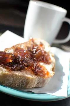Jam spread on fresh bread Stock Photos