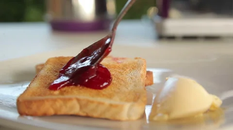 Jam spread on toasts Stock Footage 60285689