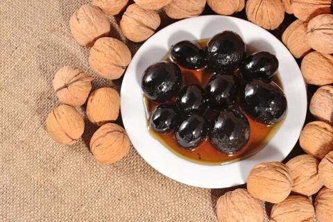 Jam from walnuts. Top view. Stock Photos