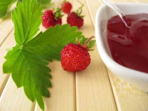 Jam with wild strawberries Stock Photos