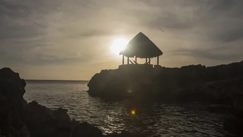 Jamaica: Thatch Hut with Clouds at Sunset Stock Footage 72159353