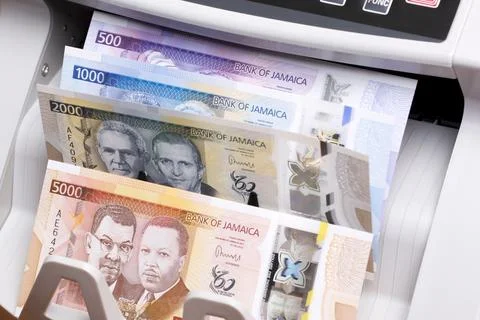 Jamaican dollar in the counting machine Stock Photos