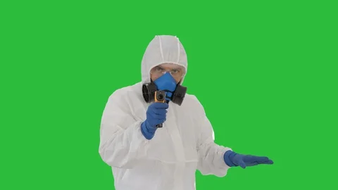 James Bond parody Doctor checking temperature on a Green Screen, Chroma Key. Stock Footage 129702199