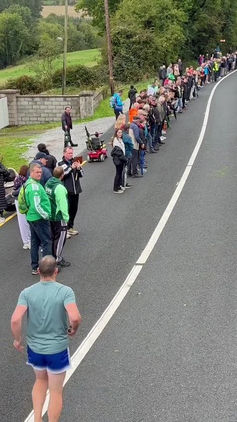 James O'Donovan in Action at Road Bowling Competition, Ballinacarriga, Cork, Ire Stock Footage 346319721