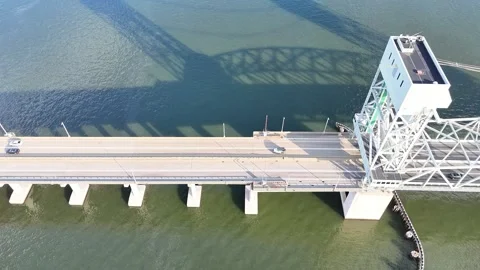James River Lift Bridge Over Calm Water With Towers Under Clear Blue Sky Sunlit Stock-Footage 332948282