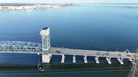 James River Lift Bridge Over Calm Water With Towers Under Clear Blue Sky Sunlit Stock-Footage 332948345