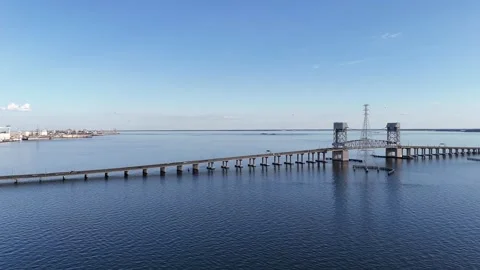 James River Lift Bridge Over Calm Water With Towers Under Clear Blue Sky Sunlit Stock-Footage 332948723