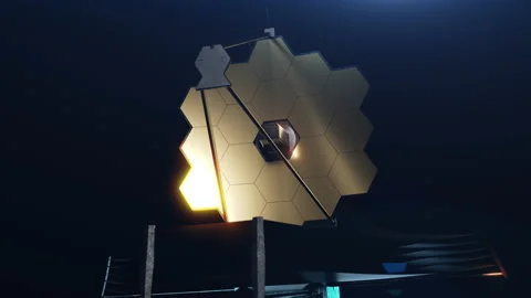 The James Webb space telescope in space. the video has an alpha channel Stock Footage 239450798
