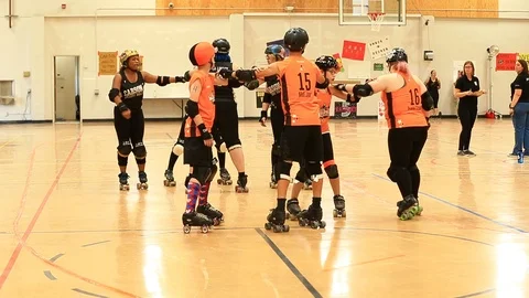 Jammers Make it Trough Blockade of Derby Girls Stock Footage 98023510