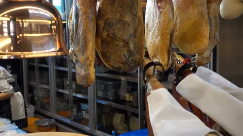 Jamon hanging in restaurant in 4K Stock Footage 122516748