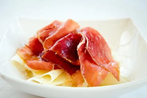 Jamon with melon . Stock Photos